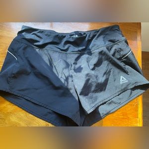 Black size small-reflective Reebok running shorts